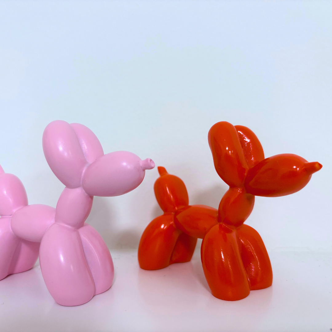 Orange Ballonhund-Figur
