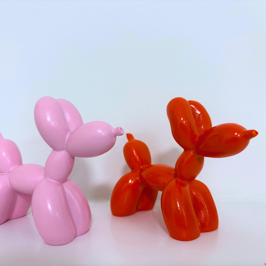 Orange Ballonhund-Figur